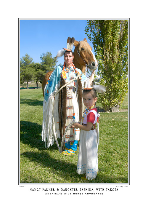 Nancy Parker with daughter Tashina and the Mustang, Takota, Las Vegas Veteran's InterTribal Pow Wow 2007 - © 2007 Mickey Cox