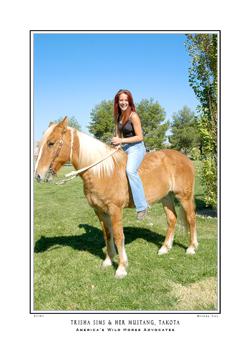 Trisha Sims with her wild Mustang, Takota, Las Vegas Veteran's InterTribal Pow Wow 2007 - © 2007 Mickey Cox